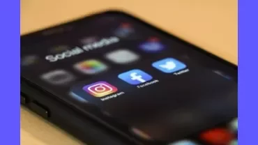 A screen of a phone with popular social media thumbnails.