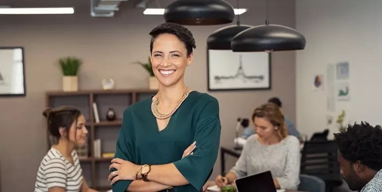 Female professional smiling in an office setting