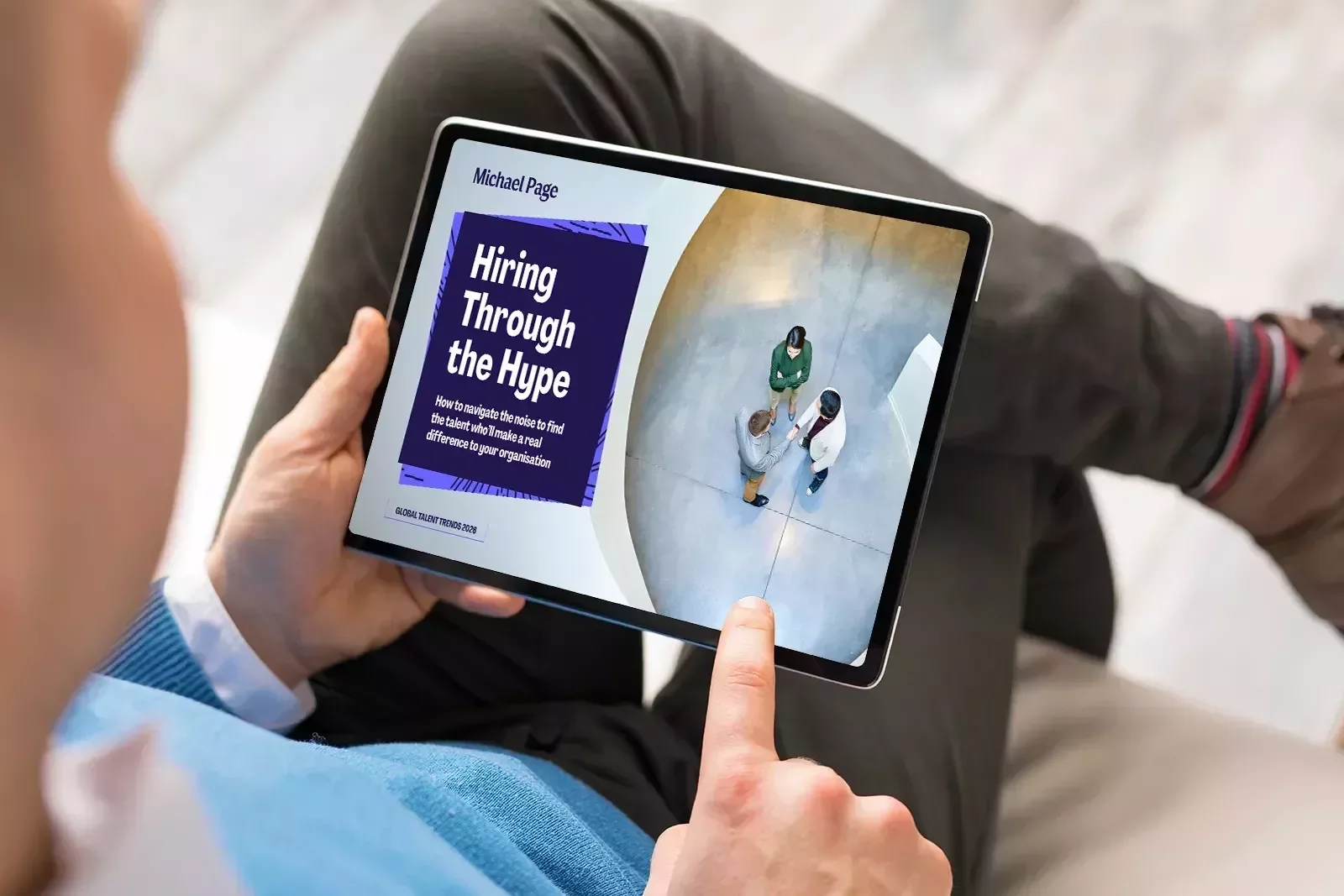 Man using iPad to view TT26 report